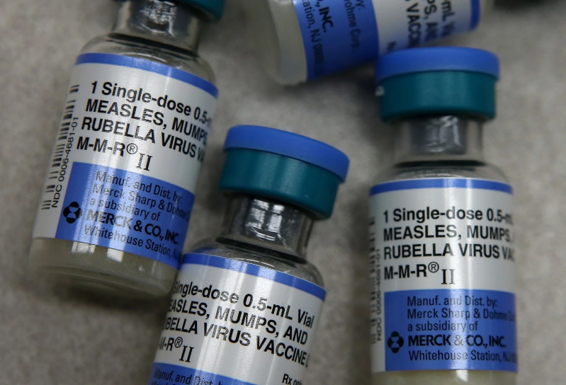 Measles, Immunization, and Refusal to Vaccinate